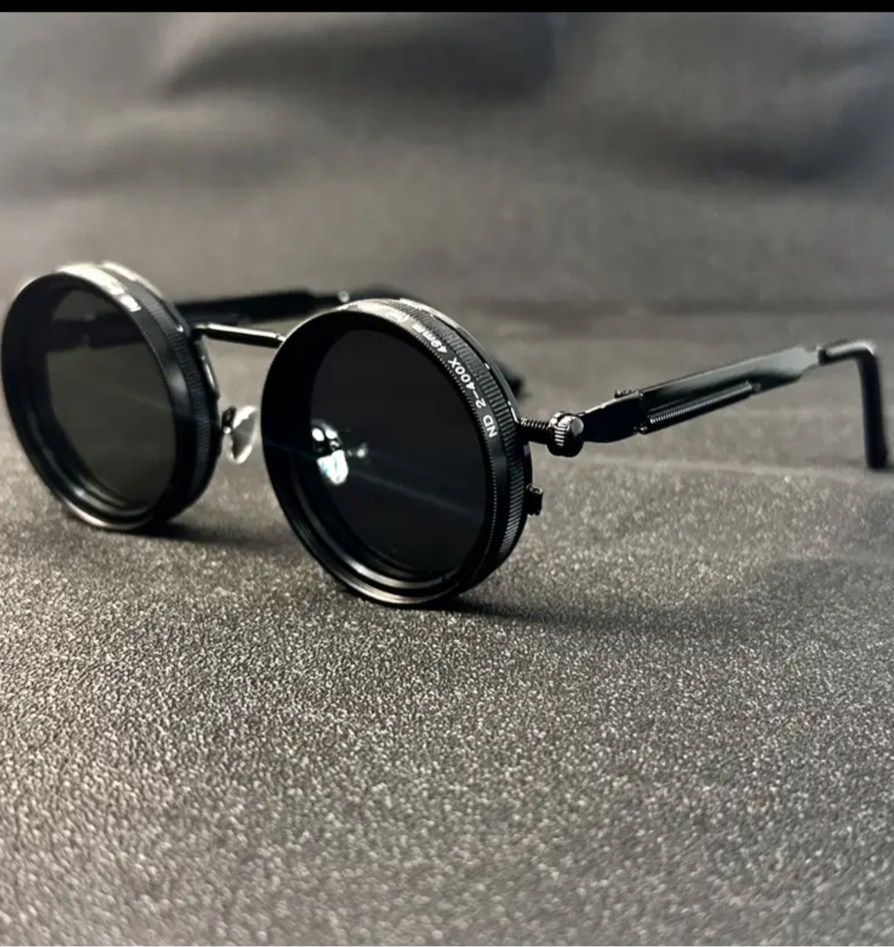 Un par de gafas estilo punk ajustables y giratorias, reducción ND de 9 niveles